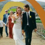 Bonnie Wright Instagram - Harry Potter actress Bonnie Wright's wedding was a celebration of love, community, and sustainability. 🌍💐

"It was important to reflect our love for the environment and use sustainable materials instead of any single-use packaging, lean into our creativity and make things ourselves, and source everything as locally and seasonally as possible," @thisisbwright shared with Brides. 

See all the details from their magical wedding at a California farm at the link in bio.

📷: @st.chelle
📋: @__abbyandcaroline
💐: @pigsty
👗: @happyisles_salon
💍: @wrightandteague