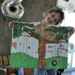 Milla Jovovich Instagram - Happy 8th birthday to my sweet, kind, thoughtful and most loving little girl Dash! She’s really the rock of our family. Such an amazing big sister to the baby, such a wonderful little sister as well. Here are some pics with the cards that we made for her! I collaged a “Magical Treehouse” card and her dad made a collage of the two of them over the years. Her older sister made the most beautiful and creative pop up card that’s so cool! Also thank you to @ballooncelebrations for the epic balloon fantasy land she woke up to this morning!