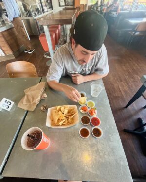 Jayden Bartels Instagram - I made guy groove drive me around in this cool truck then we got sharkys and this goof got every possible salsa you could get plus just carrots? on the side? an experience (also new YouTube video is up😋)