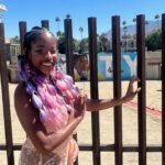 Amanda Gorman Instagram - I’ve been thinking a lot about the murals of Black figures I saw in my neighborhood growing up—mostly of dead Black public icons, often slain in their youthful prime, and often men. As I continue to hear from children through my books, the more important I truly believe it is that students of color have representations of our people, not just when they’ve been robbed of life, but also images of us LIVING, of us real and there. The next generation deserves to have artistic mirrors of themselves, young and old, alive as well as resting in power—that is to say, we merit to witness ourselves across the full spectrum of our bright human existence. Because of this, I was so happy I finally got to visit the Unity mural by @misteralek in the Palm Springs art pit! I was pleasantly surprised and incredibly grateful that the City of Palm Springs Arts Fund commissioned such a work. Thank you for this piece of peace, and for everyone who has taken time out of their day to visit 💛💛🙏🏿