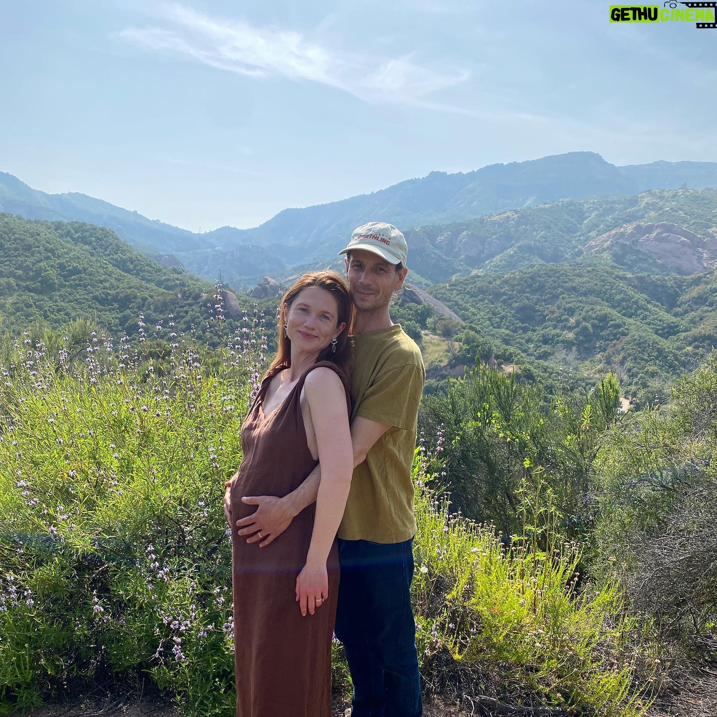 Bonnie Wright - 0.9 Million Likes - We’re having a baby! So excited to share this beautiful land with them. What a wild and humbling journey pregnancy is, transforming to make space for new life. Andrew and I can’t wait to meet our baby later this year and become parents 🥹🌈 It feels like they’re coming to say hello in the little rainbow orb across my belly