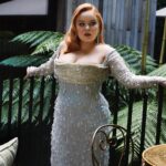 Nicola Coughlan Instagram - This Barbie got ready with @britishvogue 💎

This look took an army of people to put together so I just wanted to give a moment to thank them all for their time and talent.

When I met the legendary Jacqueline Durran, costume designer for Barbie she asked me what I would like to wear in the movie (!) I was a big Barbie fan as a kid and had compiled pictures of ones I had, including one called Sparkle Eyes Barbie. When she saw this she asked me if I wanted my costume to match the Barbie I had as a little girl I lost my mind with excitement.

I knew I wanted my dress for the premiere to be in homage to my Barbie and so my incredible stylist @aimeecroysdill worked tirelessly with brilliant @wiederhoeft_  who designed this breathtaking gown. They then collaborated with @tencel_europe & @swarovski to make the look sustainable which is no mean feat

For glam the one and only @neilyoungbeauty worked with mother @patmcgrathreal to create this doll come to the real world look.

My Barbie is a red head so @mrjasonhogan @joshwood worked his colour magic and my king @halleybrisker brought Hollywood to London using Barbie pink tools from @dysonhair

Then my Barbie Girl @michelleclassnails gave this doll the most perfect chrome pink nail to complete the look.

To read the full article in Vogue go to the link in my bio 

In Barbie’s words it truly was the best day ever 💖💖💖

📷 @billiescheepersphotography 
Styled by @aimeecroysdill in custom @wiederhoeft_ collaboration with @tencel_europe
Diamonds: @messikajewelry 
Custom shoes: @malonesouliers 
Hair: @halleybrisker using @dysonhair 
Colourist @mrjasonhogan @joshwood 
Make up: @neilyoungbeauty using @patmcgrathreal 
Nails: @michelleclassnails 
Skin prep: @guendalinatheskinsculpter 
Publicist: @vrwpublicity 
Tailor: @courtiere_bernie 
Styling assistant: @pruefisher @emmaalisonseery
