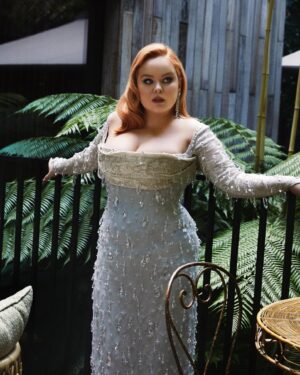 Nicola Coughlan Instagram - This Barbie got ready with @britishvogue 💎

This look took an army of people to put together so I just wanted to give a moment to thank them all for their time and talent.

When I met the legendary Jacqueline Durran, costume designer for Barbie she asked me what I would like to wear in the movie (!) I was a big Barbie fan as a kid and had compiled pictures of ones I had, including one called Sparkle Eyes Barbie. When she saw this she asked me if I wanted my costume to match the Barbie I had as a little girl I lost my mind with excitement.

I knew I wanted my dress for the premiere to be in homage to my Barbie and so my incredible stylist @aimeecroysdill worked tirelessly with brilliant @wiederhoeft_  who designed this breathtaking gown. They then collaborated with @tencel_europe & @swarovski to make the look sustainable which is no mean feat

For glam the one and only @neilyoungbeauty worked with mother @patmcgrathreal to create this doll come to the real world look.

My Barbie is a red head so @mrjasonhogan @joshwood worked his colour magic and my king @halleybrisker brought Hollywood to London using Barbie pink tools from @dysonhair

Then my Barbie Girl @michelleclassnails gave this doll the most perfect chrome pink nail to complete the look.

To read the full article in Vogue go to the link in my bio 

In Barbie’s words it truly was the best day ever 💖💖💖

📷 @billiescheepersphotography 
Styled by @aimeecroysdill in custom @wiederhoeft_ collaboration with @tencel_europe
Diamonds: @messikajewelry 
Custom shoes: @malonesouliers 
Hair: @halleybrisker using @dysonhair 
Colourist @mrjasonhogan @joshwood 
Make up: @neilyoungbeauty using @patmcgrathreal 
Nails: @michelleclassnails 
Skin prep: @guendalinatheskinsculpter 
Publicist: @vrwpublicity 
Tailor: @courtiere_bernie 
Styling assistant: @pruefisher @emmaalisonseery