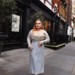 Nicola Coughlan Instagram - This Barbie got ready with @britishvogue 💎

This look took an army of people to put together so I just wanted to give a moment to thank them all for their time and talent.

When I met the legendary Jacqueline Durran, costume designer for Barbie she asked me what I would like to wear in the movie (!) I was a big Barbie fan as a kid and had compiled pictures of ones I had, including one called Sparkle Eyes Barbie. When she saw this she asked me if I wanted my costume to match the Barbie I had as a little girl I lost my mind with excitement.

I knew I wanted my dress for the premiere to be in homage to my Barbie and so my incredible stylist @aimeecroysdill worked tirelessly with brilliant @wiederhoeft_  who designed this breathtaking gown. They then collaborated with @tencel_europe & @swarovski to make the look sustainable which is no mean feat

For glam the one and only @neilyoungbeauty worked with mother @patmcgrathreal to create this doll come to the real world look.

My Barbie is a red head so @mrjasonhogan @joshwood worked his colour magic and my king @halleybrisker brought Hollywood to London using Barbie pink tools from @dysonhair

Then my Barbie Girl @michelleclassnails gave this doll the most perfect chrome pink nail to complete the look.

To read the full article in Vogue go to the link in my bio 

In Barbie’s words it truly was the best day ever 💖💖💖

📷 @billiescheepersphotography 
Styled by @aimeecroysdill in custom @wiederhoeft_ collaboration with @tencel_europe
Diamonds: @messikajewelry 
Custom shoes: @malonesouliers 
Hair: @halleybrisker using @dysonhair 
Colourist @mrjasonhogan @joshwood 
Make up: @neilyoungbeauty using @patmcgrathreal 
Nails: @michelleclassnails 
Skin prep: @guendalinatheskinsculpter 
Publicist: @vrwpublicity 
Tailor: @courtiere_bernie 
Styling assistant: @pruefisher @emmaalisonseery