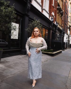 Nicola Coughlan Instagram - This Barbie got ready with @britishvogue 💎

This look took an army of people to put together so I just wanted to give a moment to thank them all for their time and talent.

When I met the legendary Jacqueline Durran, costume designer for Barbie she asked me what I would like to wear in the movie (!) I was a big Barbie fan as a kid and had compiled pictures of ones I had, including one called Sparkle Eyes Barbie. When she saw this she asked me if I wanted my costume to match the Barbie I had as a little girl I lost my mind with excitement.

I knew I wanted my dress for the premiere to be in homage to my Barbie and so my incredible stylist @aimeecroysdill worked tirelessly with brilliant @wiederhoeft_  who designed this breathtaking gown. They then collaborated with @tencel_europe & @swarovski to make the look sustainable which is no mean feat

For glam the one and only @neilyoungbeauty worked with mother @patmcgrathreal to create this doll come to the real world look.

My Barbie is a red head so @mrjasonhogan @joshwood worked his colour magic and my king @halleybrisker brought Hollywood to London using Barbie pink tools from @dysonhair

Then my Barbie Girl @michelleclassnails gave this doll the most perfect chrome pink nail to complete the look.

To read the full article in Vogue go to the link in my bio 

In Barbie’s words it truly was the best day ever 💖💖💖

📷 @billiescheepersphotography 
Styled by @aimeecroysdill in custom @wiederhoeft_ collaboration with @tencel_europe
Diamonds: @messikajewelry 
Custom shoes: @malonesouliers 
Hair: @halleybrisker using @dysonhair 
Colourist @mrjasonhogan @joshwood 
Make up: @neilyoungbeauty using @patmcgrathreal 
Nails: @michelleclassnails 
Skin prep: @guendalinatheskinsculpter 
Publicist: @vrwpublicity 
Tailor: @courtiere_bernie 
Styling assistant: @pruefisher @emmaalisonseery