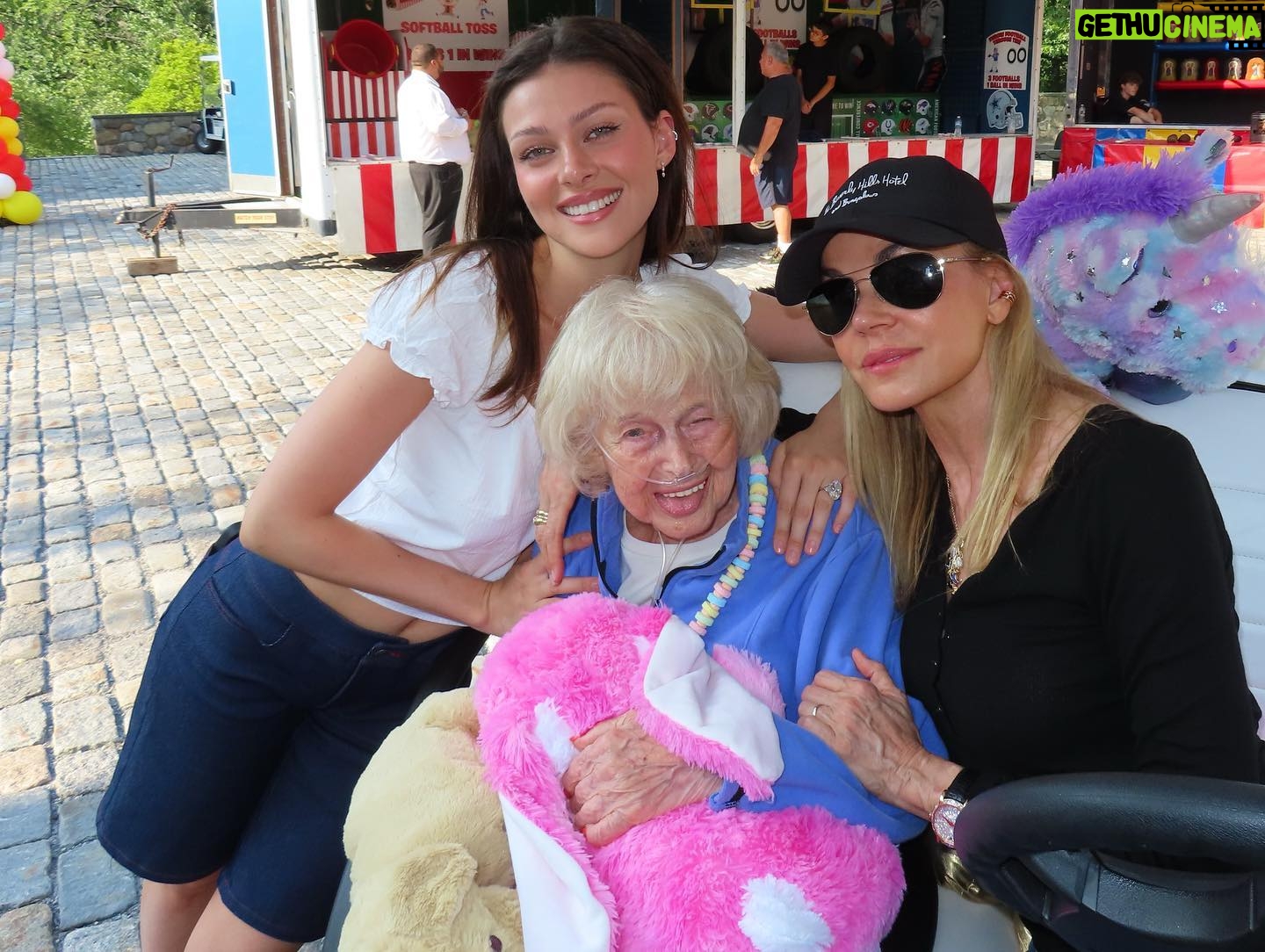 Nicola Peltz Beckham Instagram - We brought the carnival to bunny today 💘🎡🎠🎟️🍭happy 95th my queen! I love you more than I can ever put into words. You are the most amazing woman in the world and I’m the luckiest girl to call you my naunni. I hope all your wishes come true!