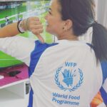 Hend Sabry Instagram - في البلاد التي تواجه مختلف الأزمات من نزاعات أو غيرها، غالبًا ما تأكل النساء والفتيات أخيرًا وأقلاً في أسرهن.
متخيلين كم منهن كان ممكن أن يكونوا جزءا من المنافسة على كأس العالم للسيدات 2023 في حال أتيحت لهن الفرص الكافية في التغذية السليمة منذ الصغر؟ ⚽ 
سعيدة بمشاركتي لبرنامج الأغذية العالمي اليوم في القضاء على الجوع وتمكين النساء في جميع أنحاء العالم!

In countries facing conflict, famine and hunger, women and girls often eat last and least in their households. Imagine how many of them could’ve been competing TODAY in the FIFA World Cup 2023 for women? ⚽
 
Today, I’m wearing my @WFP jersey with pride to show my commitment to ending hunger and empowering women globally! Stand with me in the fight against hunger during the #FIFAWWC semi-finals.
@wfp_mena @cindymccain @fifawomensworldcup