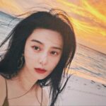 Fan Bingbing Instagram - Sunset by the beach.