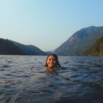 Jessie Reyez Instagram - The amount of peace I feel when I swim out into the middle of a lake is almost inexplicable. Almost. But I’ll try. I think I love it so deeply because a lake is an expression of the unknown, where when I open my eyes, the darkness seems wildly infinite…and yet all the while it reminds my subconscious of the womb we came from. 
I find clemency here. 
I find a sovereignty in water that land has never been able to give me. 
It pardons the gravity of life.
And in that forgiveness 
And in that weightlessness 
I am free. 

📸 @danecollison
