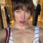 Milla Jovovich Instagram - I’m so excited to have been invited to attend the @amfar event and help raise money for this cherished cause in Venice, Italy! It’s been a healthy decade I haven’t been to Venice and it’s such a dream coming back here. Riding from the airport in a water taxi, watching the delicate, medieval city, opening up before me in such a calming and soothing way after a long and sleepless flight. The feel of the boat rocking underneath me is already getting me prepared for delights to come. We float on the water and get dropped at our hotel, which is a thousand year old monastery that was actually abandoned for over one hundred years before it got renovated into a hotel.  A bit on the spooky side, but I’m totally in to see some ghosts, hands down!  The light is so gorgeous everywhere that even with no sleep on the flight (I started playing Baldur’s Gate 3🤯 and I wasn’t about to have something as pesky as sleep stop me from jumping down that rabbit hole😂 ) I just put on minimal make up, tinted sunscreen, mascara, spf lipstick, I feel red carpet ready! This light ignores signs of jet lag and literally gives you a wink and secretly hands you 5 years back without even asking for a thank you. We’re only here for a few days, @everanderson is here working with the wonderful team @miumiu, doing her thing  and we brought our little Dash with us so we could make her feel grown up and special. It’s hard to give all three of my girls proper mama time when our 3 year old , Osian, is around. She’s just a mighty force of nature that demands absolute and undivided attention and the more you give, you know it’s only enough when your essence has completely disappeared into her own. She’s a smart kid😂. Goes without saying that we’re having a blast! I’ll go through more photos and do a nice dump when I get home! Thank you @amfar again for believing in me and having me here to support you for so many amazing years and thank you @miumiu for always taking care of my incredible young woman, my heart, Ever. ❤️🧨💥✨✨✨