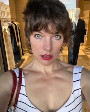 Milla Jovovich Instagram - I’m so excited to have been invited to attend the @amfar event and help raise money for this cherished cause in Venice, Italy! It’s been a healthy decade I haven’t been to Venice and it’s such a dream coming back here. Riding from the airport in a water taxi, watching the delicate, medieval city, opening up before me in such a calming and soothing way after a long and sleepless flight. The feel of the boat rocking underneath me is already getting me prepared for delights to come. We float on the water and get dropped at our hotel, which is a thousand year old monastery that was actually abandoned for over one hundred years before it got renovated into a hotel.  A bit on the spooky side, but I’m totally in to see some ghosts, hands down!  The light is so gorgeous everywhere that even with no sleep on the flight (I started playing Baldur’s Gate 3🤯 and I wasn’t about to have something as pesky as sleep stop me from jumping down that rabbit hole😂 ) I just put on minimal make up, tinted sunscreen, mascara, spf lipstick, I feel red carpet ready! This light ignores signs of jet lag and literally gives you a wink and secretly hands you 5 years back without even asking for a thank you. We’re only here for a few days, @everanderson is here working with the wonderful team @miumiu, doing her thing  and we brought our little Dash with us so we could make her feel grown up and special. It’s hard to give all three of my girls proper mama time when our 3 year old , Osian, is around. She’s just a mighty force of nature that demands absolute and undivided attention and the more you give, you know it’s only enough when your essence has completely disappeared into her own. She’s a smart kid😂. Goes without saying that we’re having a blast! I’ll go through more photos and do a nice dump when I get home! Thank you @amfar again for believing in me and having me here to support you for so many amazing years and thank you @miumiu for always taking care of my incredible young woman, my heart, Ever. ❤️🧨💥✨✨✨
