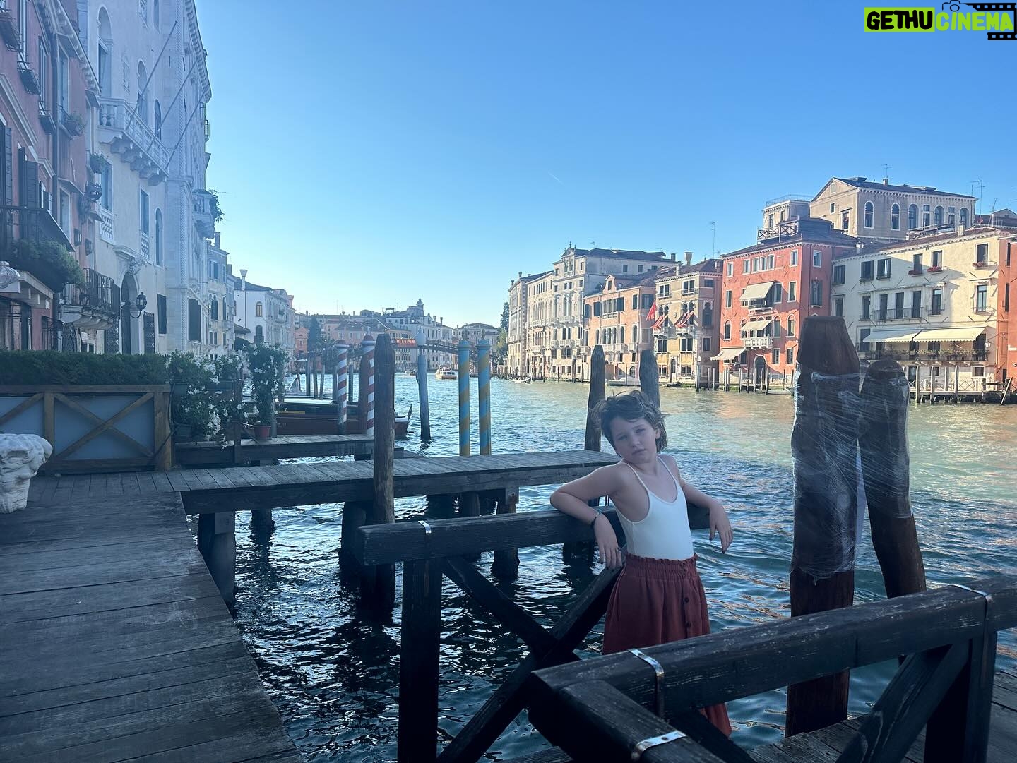Milla Jovovich Instagram - So here’s the moment no one’s been waiting for. But I finally got some of my favorite shots from our trip to #venicefilmfestival for @amfar! Warning, I might add a few in the next couple of days as stand alones, but this is the main dump. We swept across the canals in boats, took gondola rides with our kids for the first time and ate some insanely amazing food along the way. We stopped at the @guggenheim_venice which was truly the highlight of the trip. To see my kids so intrigued and inspired by all the post modern art completely justified them missing their first day of school. I’m a true believer that real like experience trumps anything you read in a textbook and to have my 8 year old tell me that her favorite paintings were made by Tanguy was a pivotal point in my parenting journey. It was truly unforgettable on so many levels. So I’ll shut up now and let you swipe to experience the beauty of Venice. Enjoy!