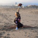 Kinsey Wolanski Instagram - Anything to make the catch 😂🏈 

#sports #football #NFL #fantasyfoofball #girls