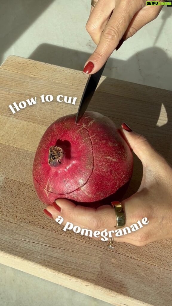 Daniella Monet Instagram - HOW to cut a pomegranate? Look no further! 👀

Anyone else obsessed with them? As soon as they are in season, it’s pomegranate central here. 🙋‍♀️

Let’s get into how to cut them. 

1️⃣ use a sharp knife to cut off the top of the pomegranate. You can score it like I did or just chop it off. I find when I score it, it makes less of a mess.

2️⃣ then, score the sides of the pomegranate. Holding the fruit, you might notice that there are 5-6 gentle ridges in its surface. Use your knife to make thin slits along those ridges.

3️⃣ after you make the cuts, use your hands to peel the fruit open and gently divide it into segments.

Now you know how to cut a pomegranate, but what kinds of recipes do you add pomegranates to?!? ✨Comment POM and we will send you access to our pomegranate recipes!✨

Pomegranates are rich in fiber and antioxidants. They’re know to help with digestion. Definitely take advantage of pomegranate season! {I wish there was a pomegranate emoji} 🤪