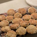 Mayim Bialik Instagram - Couldn’t resist sharing some festive cooking posts. These first 2 photos are broccoli arancini from @Moby’s Little Pine cookbook, which I make with gluten-free Panko.

Next up are my veganized “Darrell’s ‘Forget-the-Cookies-Just-Give-Me-That-Batter’ Chocolate Chip Cookies” that I was in the process of making during yesterday’s Live with @jonathancohenofficial (head over to @bialikbreakdown if you missed it!). Shout out to my 1987 edition of KidsCooking: A Very Slightly Messy Manual from Klutz press (a pretty cool company) for the recipe.

INGREDIENTS:
- 1/2 cup vegan butter
-  1/2 cup brown sugar
- 1/2 cup white sugar (yes, it’s a lot of sugar, but that’s why I only make them for the holidays 😬)
- 1 tsp vanilla extract
- 1 vegan egg replacement (I use Bob’s Mill egg replacer)
- 1 1/8 cups flour (If I’m feeling frisky, I replace 3/4 cup of the flour with cocoa. That’s what I did with this recipe. 🤫
- 1/4 tsp salt
- 1/2 tsp baking soda
- 1 bag (6 oz) vegan chocolate chips
- 1/2 cup walnuts - optional (sometimes I make them with pecans but this time I did it with walnuts)

INSTRUCTIONS:
1. In a small pan, melt the butter. While it’s hot, add both sugars. Stir, then let cool a bit.
2. While the butter mixture is cooling, mix the flour, baking soda, and salt in a mixing bowl.
3. In a separate small bowl, stir the egg replacer in with the vanilla and butter mixture.
4. Add the butter, egg replacer, and vanilla to the flour mixture in the mixing bowl. Stir again, then add chocolate chips and nuts if you want them.
5. Stir everything until it’s all mixed up well and put the bowl in the refrigerator to cool for about an hour.
6. Preheat the oven to 375 degrees F.
7. Roll the dough into walnut-sized balls, put them onto an ungreased baking sheet, and bake for 10 min. Allow to cool, and enjoy!