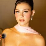 Nicola Peltz Beckham Instagram - thank you so much for having me last night @academymuseum what a special night 🎀🪽🎀 (gracie’s outfit is iconic !!! )