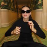 Nicola Peltz Beckham Instagram - @balenciaga 🌴🪽🎀🖤🌴❤️‍🔥💖🕶️