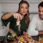 Jessie James Decker Instagram - Cranberry Brie Pull-Apart Bread is one of our favorite appetizers for Christmas✨🥖 It’s a fun way to serve brie with all of those yummy flavors of cranberry and pecans without doing the traditional baked Brie. Serve this to your guests and I guarantee there will be absolutely none left! 

Get the recipe from my new cookbook Just Eat! Link in bio to order ✨