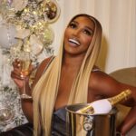 NeNe Leakes Instagram - The Holiday season is here! Get into the mood with a Bottle of @officialbelaire ‘Tis the season @richforever #champagne #ladiesofsuccess