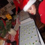 Madison Pettis Instagram – Our 12th annual Secret Santa 🥹 We do matching PJs, pillsbury cookies, lots of wine, gifts   we  roast each other every year. Best night, best friends ♥️