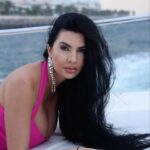 Lamitta Frangieh Instagram - The countdown is on, glam it for the upcoming year from @polinis_boutique  unique items 💫
Get my look with this amazing fushsia dress & crystal sandals ! 
Location : La ville suite , city walk 

📸 @hossamelhalwagy_photography