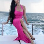 Lamitta Frangieh Instagram - The countdown is on, glam it for the upcoming year from @polinis_boutique  unique items 💫
Get my look with this amazing fushsia dress & crystal sandals ! 
Location : La ville suite , city walk 

📸 @hossamelhalwagy_photography