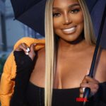 NeNe Leakes Instagram - SWIPE: When it’s cold outside, who are you holding 😝