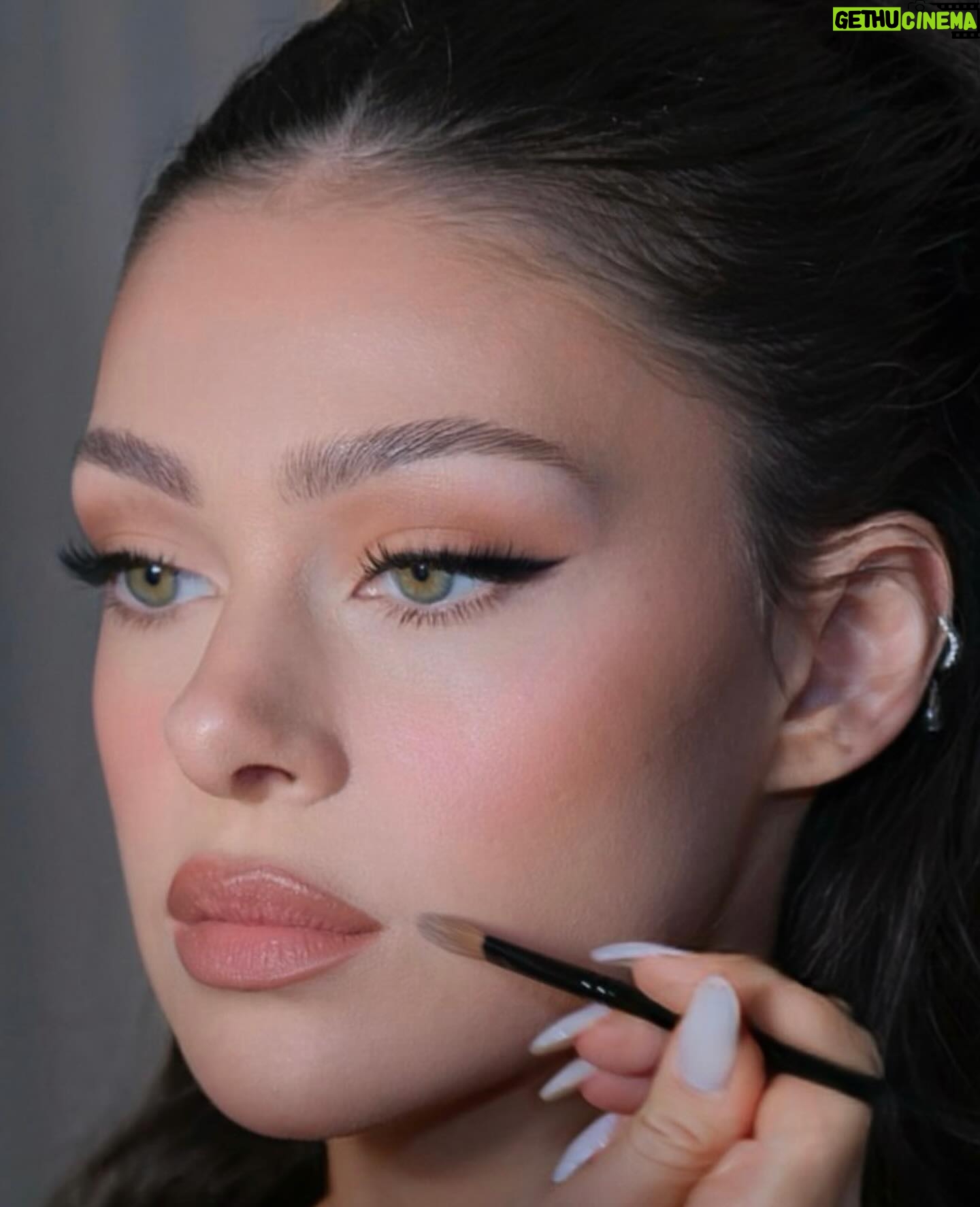 Nicola Peltz Beckham Instagram - glam by family @kateleemakeup and @hairbyadir for Lola premiere 🩷🪽🩷