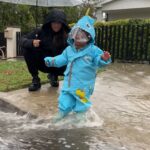 Jeannie Mai Instagram – Rainy days in LA get sunnier wit Coco in these streets 🦖💦