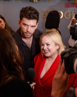 Nicola Coughlan Instagram - This one’s for the wallflowers ❤️

Our first @bridgertonnetflix event for Season 3 and I’m already very overwhelmed and very grateful for your beautiful responses to what you’ve seen, I promise you we’re only getting started, this season is a magical one even if I do say so myself

Styled by @aimeecroysdill wearing full @stellamccartney 
Makeup @neilyoungbeauty 
Hair @halleybrisker 
Hair colour by @mrjasonhogan @joshwood 
Skin prep @guendalinatheskinsculpter 
Styling assistant @emmaalisonseery 
@vrwpublicity 

Special thank you to the incredible @claridgeshotel for such a gorgeous stay