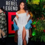 Jessie Reyez Instagram - “Is this love” cover, out now. When I was presented with the opportunity to cover such a legendary song for such a legendary movie, I almost said no. Considering how much I’ve always looked up to Bob, it seemed almost sacrilegious to attempt a song that i find so holy. “Is this Love”. A beautiful message from an artist who has provided medicine in the form of music to the world; a world that feels like it needs double the dose right now. Like most of us, there have moments in my life where burdens of the human experience have been heavier than I could bear. One moment in particular, I had landed in Toronto, circumstances rendered my tears to be waves and I couldn’t come up for air. I had to do a gig that night and I was trying to find grounding. I remember laying on a bench near the airport downtown and looking up at a canopy of trees above me. Bob came on and I felt instantly soothed. My tears dried. I decided to say yes to singing this because I chose to view it as an opportunity to pay homage to the sacred. To all involved, thank you for inviting me to be a part of this @ziggymarley @onelovemovie 

The last photo was taken years ago by @demarp when i used to be a bartender in Florida. Back when the idea of being a full time musician was as just a dream. The respect and love I’ve had for Bob goes very far back. Jamaica, the world owes you one.🇯🇲❤️