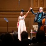 Amanda Gorman Instagram – A dream come true to perform at Carnegie Hall with @janvoglercello. Thank you to @dornmusic and all those who came to see us. It was an incredible opportunity of a lifetime, and one that I will continue to cherish long after the curtain call 💛

.
.
.

Amanda Gorman and Jan Vogler
An Evening of Poetry and Bach
Carnegie Hall
February 17, 2024
Presented by Dorn Music

Photos by Chris Lee @chrisleephotonyc

Styling: @jasonbolden and @prada
Makeup: @lyndaesparza
Hair: @aggie_hair
