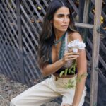 Nikki Reed Instagram - Playing dress up on the farm in our new Bayou turquoise with a few of my favorite finds that I wanted to highlight here. From this @madlyvintage top made out of repurposed vintage Missoni textiles, to my dear sister @motherofpearl ‘s gorgeous organic cotton ecru jeans, I love watching modern meet vintage meet repurposed with a story. That’s not all, the entire Mother of Pearl line prioritizes sustainability from their sourcing, to their “fiber to final” promise, to their consciousness around eliminating harmful dyes & chemicals by using a special OZONE treatment to get to their desired wash effect. I love watching women shine, and I love that these boss babes are taking innovation to the next level from concept to completion! 

Photos by @samidrasin for @bayouwithlove