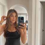 Daniella Monet Instagram – life has been interesting lately…

less eventful, more intentional.
with the exception of Andrew doing something a little out of the ordinary (spartan race) we’ve (including the kids) have made some very basic changes in an effort to find more balance and regulation lately. 
Intuitively I’ve felt like my hormones and/or adrenals have been a little wonky lately based off some recent hormonal breakouts, bloating, cycle intensity, etc.

With so many tools in my tool-belt I looked at this as an opportunity for a lifestyle improvement.

Here’s some of the small adjustments we’ve made: 
• Lots more outside time, lunch   dinner al fresco
• Minimal tv
• *getting ready* got a new curling iron, and simply doing my hair has helped me look and feel better 
• yoga @ home – busted my yoga mats out, and now have one upstairs and one downstairs. The kids and I love them
• This means more stretching – instrumental, because I’ve been feeling so much tension in my neck and shoulders
• More at home dates 🩷 that means baths, pillow talk, etc
• Lots of music, right now our family is big on Teddy Swims
• Earlier dinners, personally trying not to eat 2-3hrs before bed
• Earlier bed time, Andrew and I have been out like a light by 10p
• been doing this for over a year, but Andrew just recently jumped on board. No phones in the bed room.
• and lastly, more water. Upped our monthly subscription to mountain valley and have been chugging more water than usual to flush out whatever toxins may be causing my skin to flair up.
• oh wait, there’s one more thing that’s new, I’m taking supplements again, and daily. I take supplements intuitively regularly but for the last week I’ve taken a multi specifically for my lifestyle regularly. 

I’m sure there’s more little things, I’ll comment them@below as they come to mind.

I’m certainly doubling down on my wellness era atm, and it feels good, not stressful, more like “where have you been” type vibes. I missed my yoga mat, I missed taking care of myself, I missed feeling like me.

xx