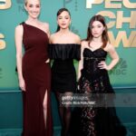 Antonia Gentry Instagram - first people’s choice brought my pops got blurry photo of tom hiddleston saw lenny kravitz perform reunited with @briannehowey @katiedouglas98 and @sllampy ate a tiny doughnut for dinner too sleepy for after party love you all can’t wait for s3 

hair: @themartyharper using @aveda 
makeup: @danadelaney 
styled by: @thomascarterphillips wearing vintage @ysl