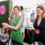 Elizabeth Banks Instagram - A weekend in Miami with @archerroosewines 💚 I had SUCH a blast serving up some cans at @sobewff with our founder and CEO @mariankleitner. Thank you to everyone who stopped by our booth and happy hour to taste the wines and say hello. We loved meeting all of you and can’t wait for next year! #sobewff