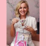 Jessica Capshaw Instagram - Major babe with a new book alert!!! I am so excited for my beautiful friend @reesewitherspoon and her new book #WhiskeyInATeacup

It’s such a great read and I immediately found a chapter that spoke to one of my all time favorite things to do...watch the video to find out ;) I am always in awe of Reese and how hard she works and how tenacious she is when she commits to something. And it’s made even sweeter that all of that hard work has paid off and put her on top of all of the bestseller lists!! Her commitment to creating content by and for women is deep and wide, incredibly nuanced, fun, smart and has real purpose!! There’s not many friends whose dress I can wear while reading a book that they’ve put on their book club list then go to the movies to see their latest film and then come home get in bed and watch their limited series for @hbo 
In short, she’s megahuman and simply fantastic. 
Congratulations, Reese!!! 😘