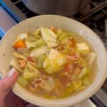 Daniella Monet Instagram – Drop your favorite veggie emoji below if you would try this soup!

I gotta be honest…I love soup. I don’t get tired of soup. Soup is life. Lentil soup, cabbage soup, veggie soup. All. The. Soups. 

It’s such an easy meal to put together & a great way to get rid of produce that is about to go bad!

For this soup, I sautéed:

•onions 🧅 
•celery 
•carrot 🥕 

Then I added in an entire head of cabbage and an entire bulb of minced garlic. 🧄 

Then I added my water, garbanzo beans, salt & lentils and let her simmer! 

Save this recipe or share it with a friend! This is a go to in our house, and mainly because the ingredients are simple and typically ones we always have on hand. 

If you want more recipes, DM @daniellasdigest with the word “DIGEST” and we will get you sorted! Recipes, unlimited food coaching and a whole menu builder 👩‍🍳🌱

#soup #vegan #plantbased #plants #plantlover #veganrecipes #plantbaseddiet #vegetarian #veggies #wellness #foodcoaching #food #foodie #march