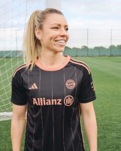 Lena Gercke Instagram - This one is sooo special! 🤩🧡🖤
 
Introducing the first ever bespoke female kit for @fcbfrauen designed by @legerbylenagercke. 🔗 Available on International Women’s Day – 8th of March!