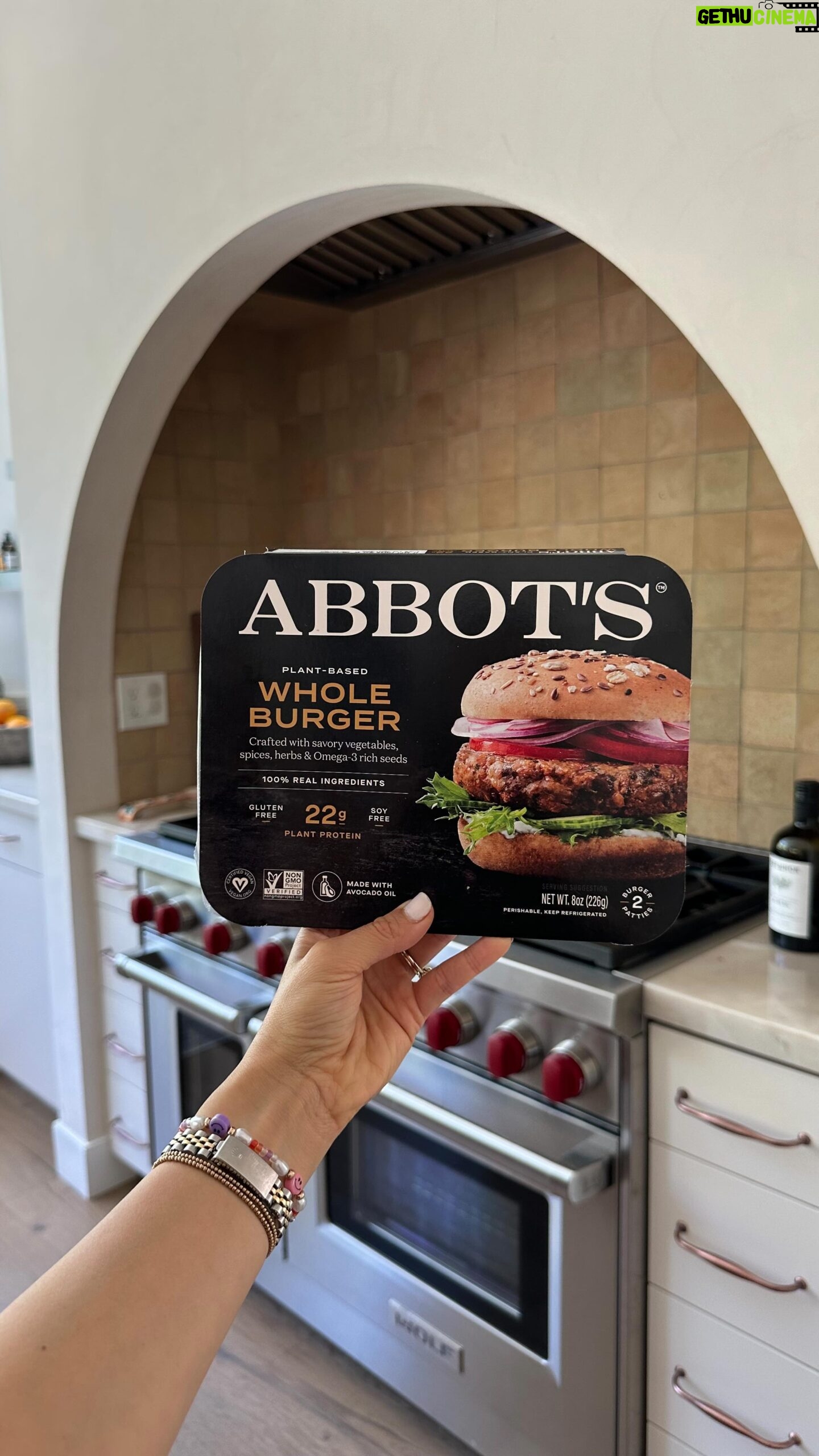 Daniella Monet Instagram - My kids first time eating a burger 😱
Truth is, it’s hard to find a plant-based burger that isn’t ultra-processed and full of unhealthy, artificial, gut-harming ingredients. Or, you have traditional veggie burgers that lack the craveable bite and are low in protein, often leaving you unsatisfied...
@liveabbots has created something completely different.
Their new Whole Burger has the protein (22 grams 🫢), 100% real food ingredients and most importantly, it’s GIO IVRY APPROVED!
Clearly they loved it…I’m serious, Gio woke up the next morning wanting more.
And on another note, it feels bittersweet to be leaving for a month to film a movie. I am so beyond grateful to get back into acting but boy am I gonna miss making home cooked meals for these sweet faces every day.
That’s why I’m testing out easy and nutritious dinners for Andrew to make. Abbot’s definitely made the cut.
Now available in Whole Foods!!!! Comment BURGER to see if there’s a Whole Foods near you! #liveabbots #ad #abbots