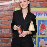 Nicola Peltz Beckham Instagram - taste the eclipse with the new @snapple elements sun flavor 🧡💗 my favorite sunny combination of flavors☀️ #snapplepartner #ad