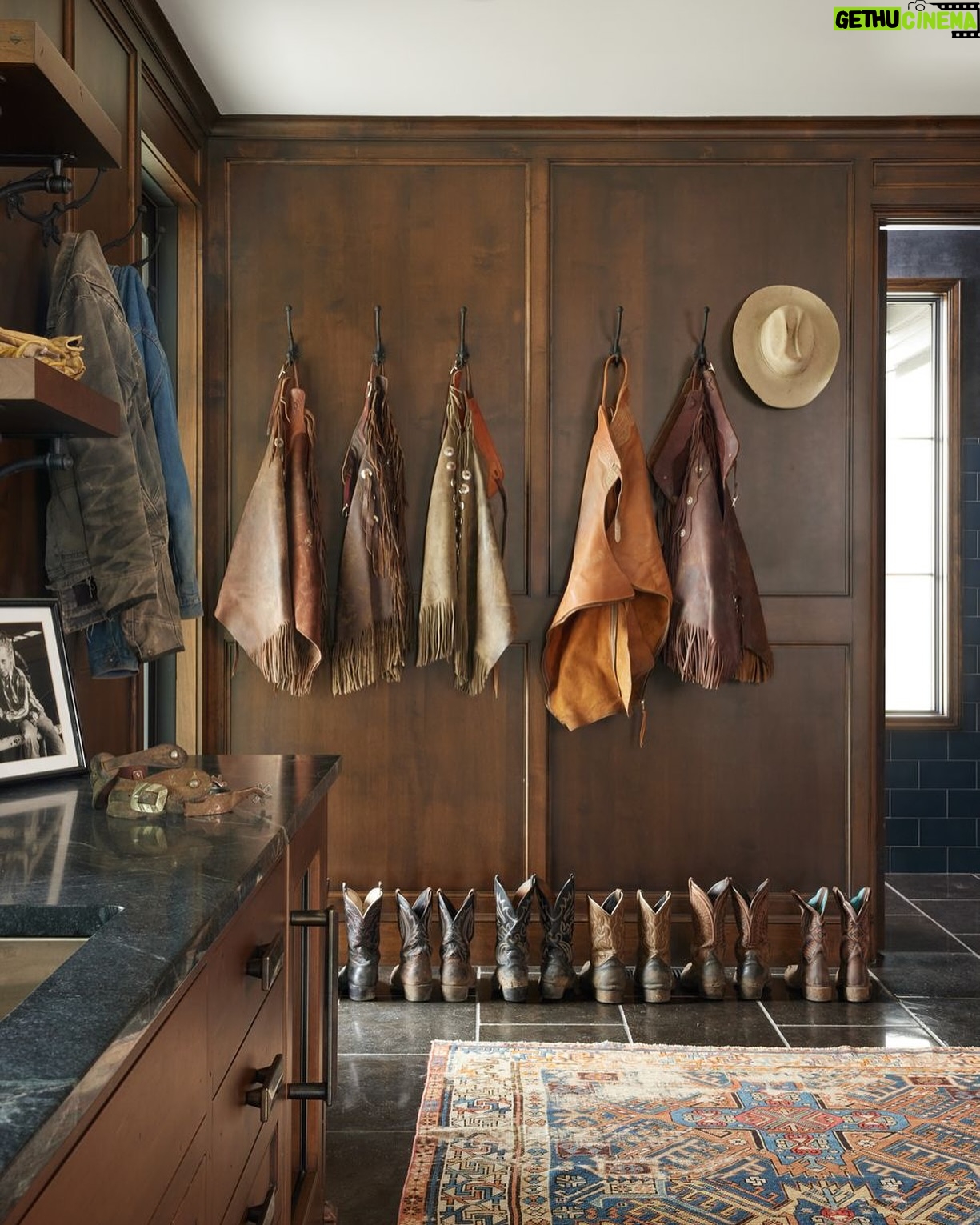 Ree Drummond Instagram - Here’s Ladd’s mud room and here’s what’s in it: coats, jackets, boots, spurs, work gloves, hats, Carmex, tools, sink, ice maker (for coolers), pop fridge (for Dr Pepper), bathroom (I don’t go in there), washer/dryer (never had separate ones before now and I embrace it), and an old pic of him and his brothers in their old barn. Oh, and mud. (And he still looks good in chaps, btw…)