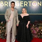 Nicola Coughlan Instagram – Surprise Oz! Lady Whistledownunder is in town 

So excited to kick off the Bridgerton World Tour in Australia! This moment has been literal years in the making I’m so excited we can finally start to share Season 3 with you all ❤️

A special thank you to THE Richard Quinn- I contacted him because I have been obsessed with this dress since I first saw it on the runway and dreamed of wearing it. I asked him if he and his brilliant team made it for me and they they did and it’s better than I ever could’ve imagined 🖤

Styled by @aimeecroysdill wearing custom @richardquinn & @malonesouliers 
Makeup @danielmartin 
Hair @gavinanesburybeauty 
@vrwpublicity 

#bridgerton #bridgertoninbowral