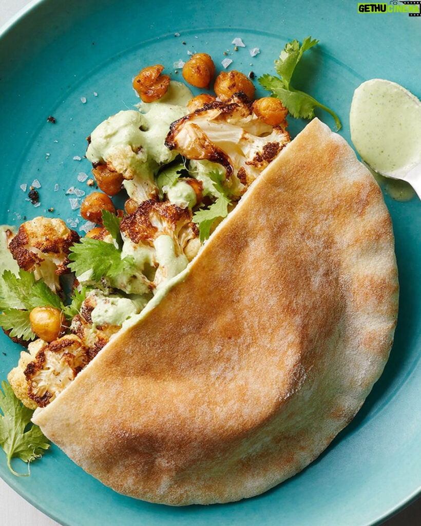 Martha Stewart Instagram - Eating more plant-based meals just got easier, and even healthier. Cauliflower and chickpeas are seasoned with cumin and roasted until golden brown. Then they're stuffed into pitas with a zesty sauce made from cilantro, lime juice, and jalapeño peppers. Get the recipe at the link in our bio. 📷: @chrisrsimpson