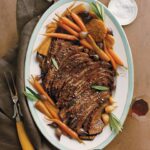 Martha Stewart Instagram – This braised brisket is meltingly tender and moist after being cooked low and slow in the oven with red wine and aromatics. Carrots, parsnips, and pearl onions are cooked in the same pan, so all you need to round out this entrée is rice or mashed potatoes, or maybe our crispy potato kugel gratin if you’re serving this delicious main course for Passover dinner. Slice the meat thin against the grain for a brisket everyone will savor and ask you to make again and again. Get the recipe at the link in our bio.