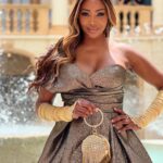 Cynthia Bailey Instagram - “sipping tea 4 a cause”.👑

@angelsforhumanityorg 

#teaforacause 

dress: @jovanifashions