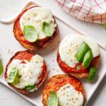 Martha Stewart Instagram – Why should bagels get to have all the fun? Each toasted English muffin is topped with marinara sauce and melty cheese before being garnished with a pinch of dried oregano and a few leaves of fresh basil. Play around with the flavors to create the pizza snack of your dreams. Get the recipe for these nostalgic treats at the link in our bio. 📷: @jason_donnelly_photography
