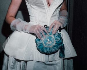 Vivienne Westwood Instagram - @juliafox wears a corseted bridal gown from the Andreas Kronthaler for Vivienne Westwood Spring-Summer 2024 collection, styled with our Rosie Circle Frame Crossbody bag – at the afterparty of the Andreas Kronthaler for Vivienne Westwood Autumn-Winter 2024/25 show.⁠
⁠
Photography by @sophographylondon