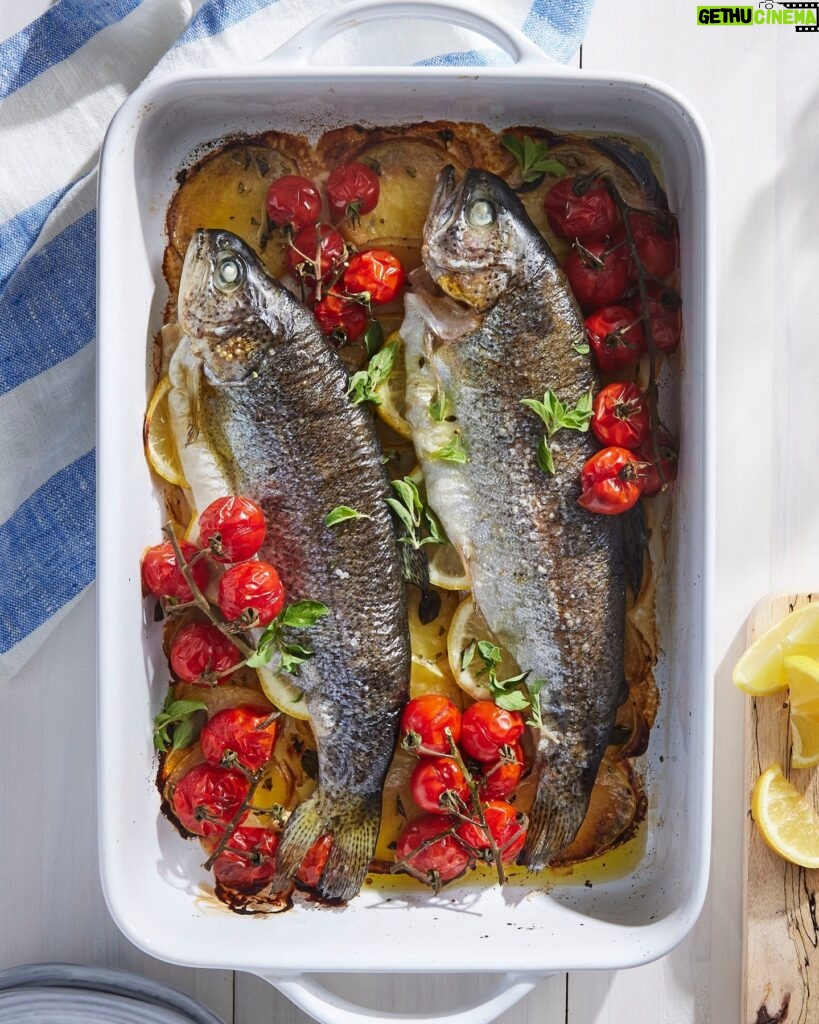 Martha Stewart Instagram - Cooking a fish whole, as opposed to fillets, is a quick and simple way to get dinner on the table. This recipe for baked trout is a whole meal since the cherry tomatoes and Yukon gold potatoes roast with the fish. Even better, everything bakes in the same dish, making this a one-pan meal. The fish's skin is crispy, the potatoes are tender, and the cherry tomatoes burst and caramelize. Get the recipe at the link in our bio. 📷: @rachelfromiowa
