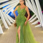 Lamitta Frangieh Instagram - When it’s time to glam 💫

Beauty by @lasirenegroup 
Dress @gio_dress 
📸 @omarhawari1 
Red carpet @sherif_thomas_official 

.
.
.
#redcarpet #longdresses #ladyingreen #dubai